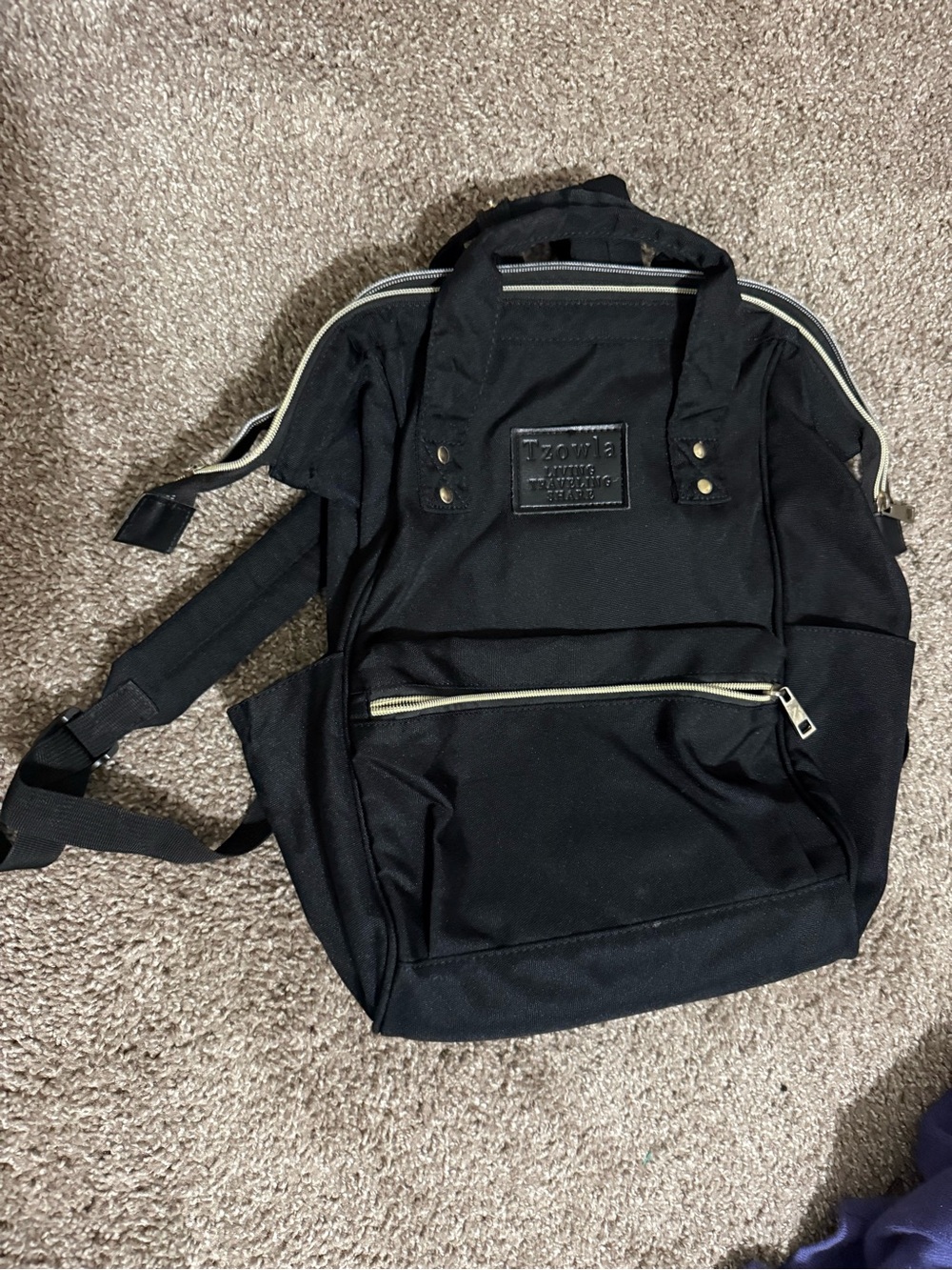 Tzowla Black Canvas Backpack